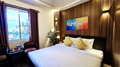 Deluxe King Room — Rosa May Hotel